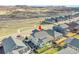 Aerial view of a home with a fenced backyard, patio, and proximity to open space at 6401 Leilani Ln, Castle Rock, CO 80108