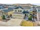 Spacious two-story home featuring a three-car garage and well-maintained landscaping at 6401 Leilani Ln, Castle Rock, CO 80108
