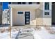 Modern home exterior with black front door at 5363 Quail St, Arvada, CO 80002