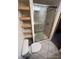 Clean bathroom with a stand-up shower and wood shelving at 2227 Canyon Blvd # 312A, Boulder, CO 80302