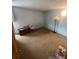 Simple bedroom with carpeted floors and ample space at 2227 Canyon Blvd # 312A, Boulder, CO 80302