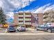 Apartment complex exterior view highlighting architecture, landscaping, and parking at 2227 Canyon Blvd # 312A, Boulder, CO 80302