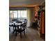 Dining area with table, chairs, and bookcase at 2227 Canyon Blvd # 312A, Boulder, CO 80302