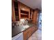 Efficient kitchen with ample wood cabinetry at 2227 Canyon Blvd # 312A, Boulder, CO 80302