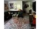 Living room with sectional sofa, coffee table, and wall art at 2227 Canyon Blvd # 312A, Boulder, CO 80302