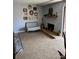 Living room with fireplace and decorative accents at 2227 Canyon Blvd # 312A, Boulder, CO 80302