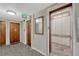 Lobby with a wooden door and access to the elevator at 2227 Canyon Blvd # 312A, Boulder, CO 80302