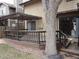 Inviting wooden deck with pergola, ideal for outdoor dining and relaxing in a private backyard setting at 11772 E Adriatic Pl, Aurora, CO 80014