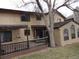 Spacious backyard featuring a wooden deck with pergola and a lush lawn at 11772 E Adriatic Pl, Aurora, CO 80014