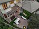 Aerial view of the patio, showcasing seating, a pergola, and landscaping, highlighting outdoor space and design at 1027 S Fillmore Way, Denver, CO 80209