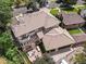 Overhead view of the home, featuring the roof, patio, landscaping, and neighborhood surroundings at 1027 S Fillmore Way, Denver, CO 80209