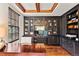 Executive office with custom built-ins, rich wood accents, and a professional workspace at 1027 S Fillmore Way, Denver, CO 80209