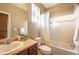 Neutral bathroom with a combined shower and tub at 2317 Winding Dr, Longmont, CO 80504