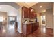 Dining area featuring wood flooring and a cherry buffet at 2317 Winding Dr, Longmont, CO 80504