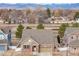 Charming single-Gathering home featuring a brick facade, two-car garage, and mountain views at 2317 Winding Dr, Longmont, CO 80504