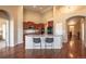 Kitchen features a large island with barstool seating and stainless appliances at 2317 Winding Dr, Longmont, CO 80504