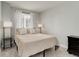 Cozy bedroom with natural light and neutral tones at 8012 S Cedar St, Littleton, CO 80120