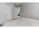 Bedroom featuring a bed, closet, and view into an adjacent room at 8012 S Cedar St, Littleton, CO 80120