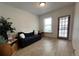 Small living room featuring a sofa and side table at 3327 Navajo St, Denver, CO 80211