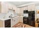 Well-lit kitchen offers stainless steel appliances, plenty of storage and eat-in nook at 2115 Hummingbird Way # 105, Georgetown, CO 80444