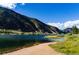 Scenic view of the lake and mountains under a clear blue sky at 2115 Hummingbird Way # 105, Georgetown, CO 80444