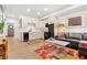 Open-concept living space with modern furnishings, light wood floors, and a sleek, functional design at 2115 Hummingbird Way # 105, Georgetown, CO 80444