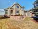 Attractive two-story home with stone accents, complemented by a landscaped front yard and attached garage at 9711 Millstone Ct, Highlands Ranch, CO 80130