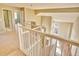 View from upper floor landing overlooking the main floor at 9711 Millstone Ct, Highlands Ranch, CO 80130