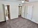 Spacious bedroom with ensuite bathroom access and ample closet space at 1244 Racine St, Aurora, CO 80011