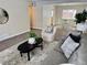 Inviting living room featuring a gray sofa and a coffee table at 1244 Racine St, Aurora, CO 80011