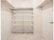 Walk-in closet with installed metal shelving at 10460 Ketchwood Ct, Highlands Ranch, CO 80130