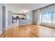 Open-concept living room blends seamlessly with a well-equipped kitchen at 10460 Ketchwood Ct, Highlands Ranch, CO 80130