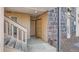 Exterior view of building with entrance and stairs at 865 S Quebec St # 104B, Denver, CO 80247