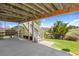 Covered patio with stairs leading to green grass and an open view at 11558 Pine Hill Way, Parker, CO 80138