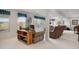 Comfortable basement living area with natural light, carpeting, and cozy seating at 11558 Pine Hill Way, Parker, CO 80138