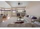 Spacious living room with a fireplace, large windows, and a bright open layout at 11558 Pine Hill Way, Parker, CO 80138