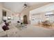 An open-concept living room seamlessly connects to the kitchen, creating an inviting space at 11558 Pine Hill Way, Parker, CO 80138