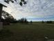 Vast backyard with mature trees and open space, perfect for outdoor activities and enjoying nature at 17852 E Long Ave, Centennial, CO 80016
