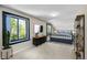 Bright bedroom with large windows and neutral decor with black metal accents at 24929 N Mountain Park Dr, Evergreen, CO 80439
