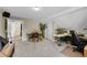 Spacious office with room for multiple desks, plants, and neutral walls at 24929 N Mountain Park Dr, Evergreen, CO 80439