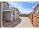 View of shed, backyard, and fence at 882 W 96Th Ave, Thornton, CO 80260