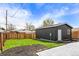 Spacious backyard with new grass and shed at 2276 Newland St, Edgewater, CO 80214