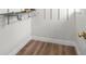Walk-in closet with shelving and laminate wood flooring at 2276 Newland St, Edgewater, CO 80214
