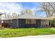 Exterior view shows the manicured lawn around the house and the roof's condition at 2276 Newland St, Edgewater, CO 80214