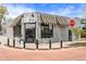 Charming corner retail building with awnings and outdoor seating at 2276 Newland St, Edgewater, CO 80214