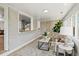 Sunroom with lots of natural light, brick, and view of the outside at 2276 Newland St, Edgewater, CO 80214