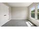 Bedroom with neutral carpet, a double door closet, and a window at 13524 Via Varra, Broomfield, CO 80020