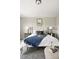 Serene bedroom with a bed, carpet, and neutral tones at 13524 Via Varra, Broomfield, CO 80020