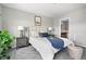 Relaxing bedroom with natural light and an ensuite bathroom at 13524 Via Varra, Broomfield, CO 80020