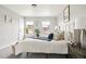 Bedroom featuring carpet and natural light from several windows at 13524 Via Varra, Broomfield, CO 80020